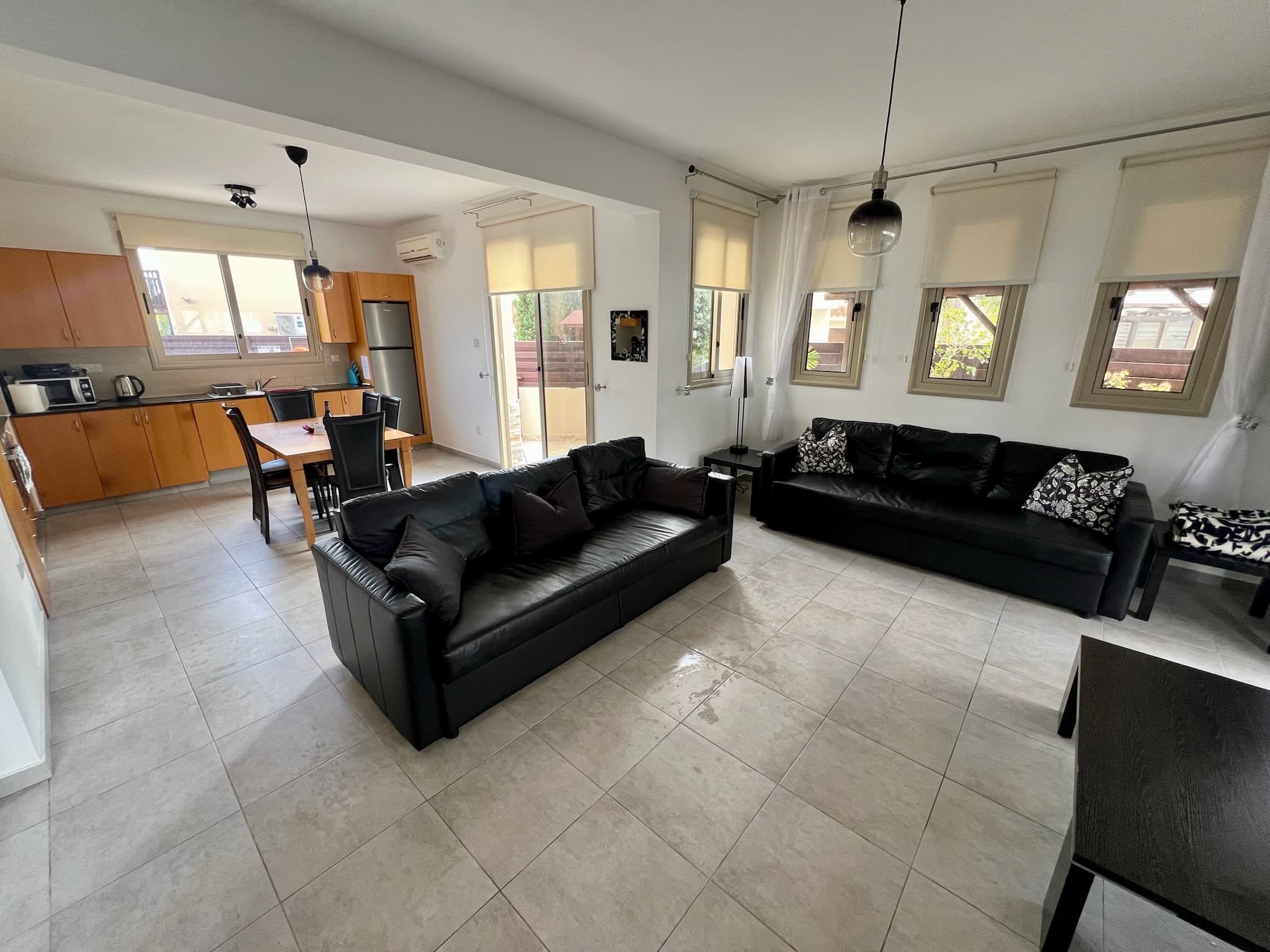 Open plan lounge and kitchen at Paradise Point