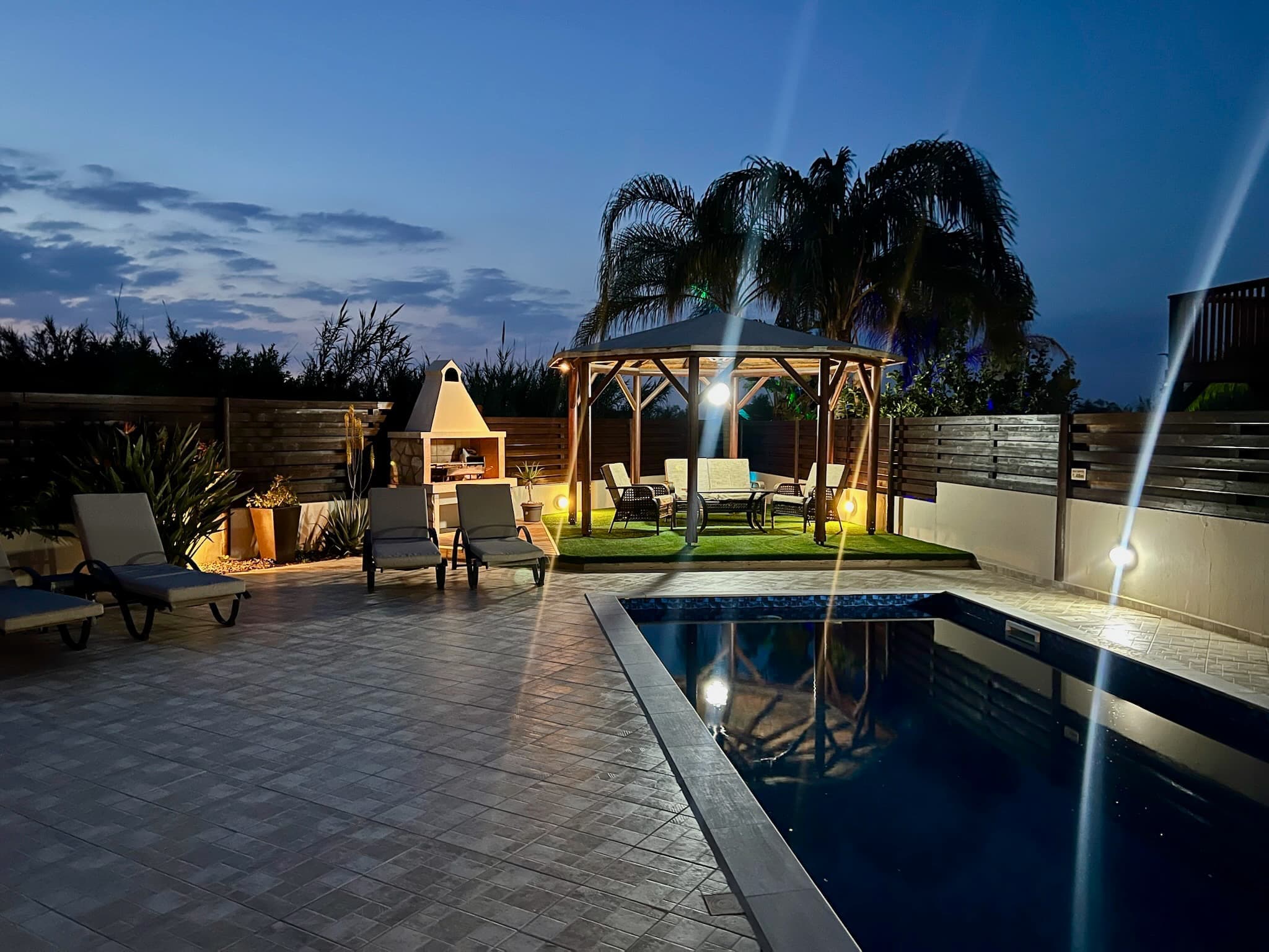 Paradise Point private villa pool at dusk